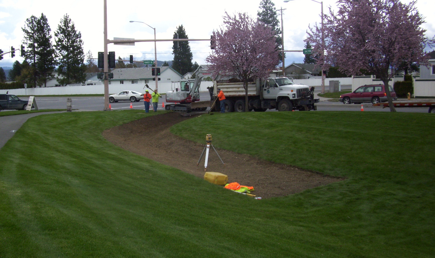 A grassy swale along a Coeur d'Alene residential street.